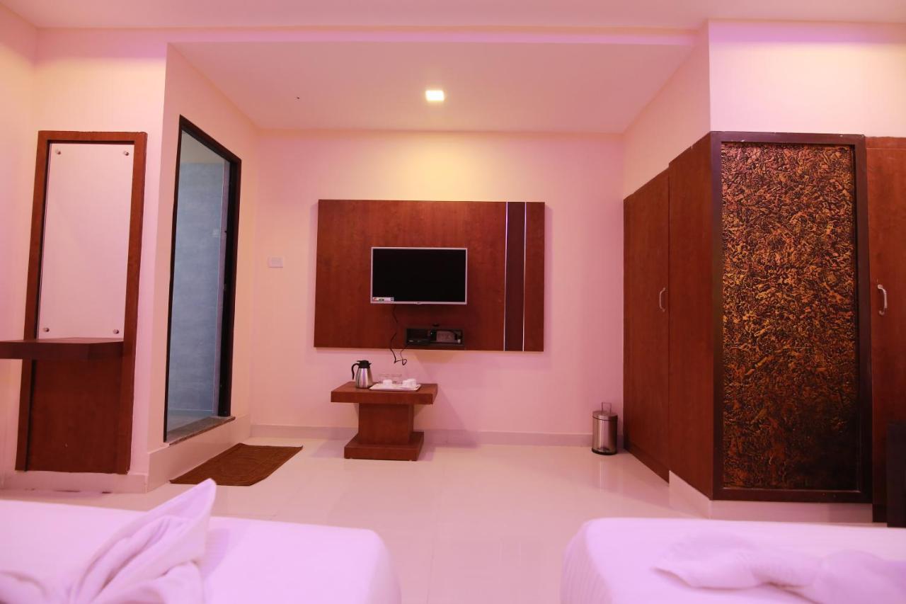 Hotel Apple Suites Bangalore Exterior foto